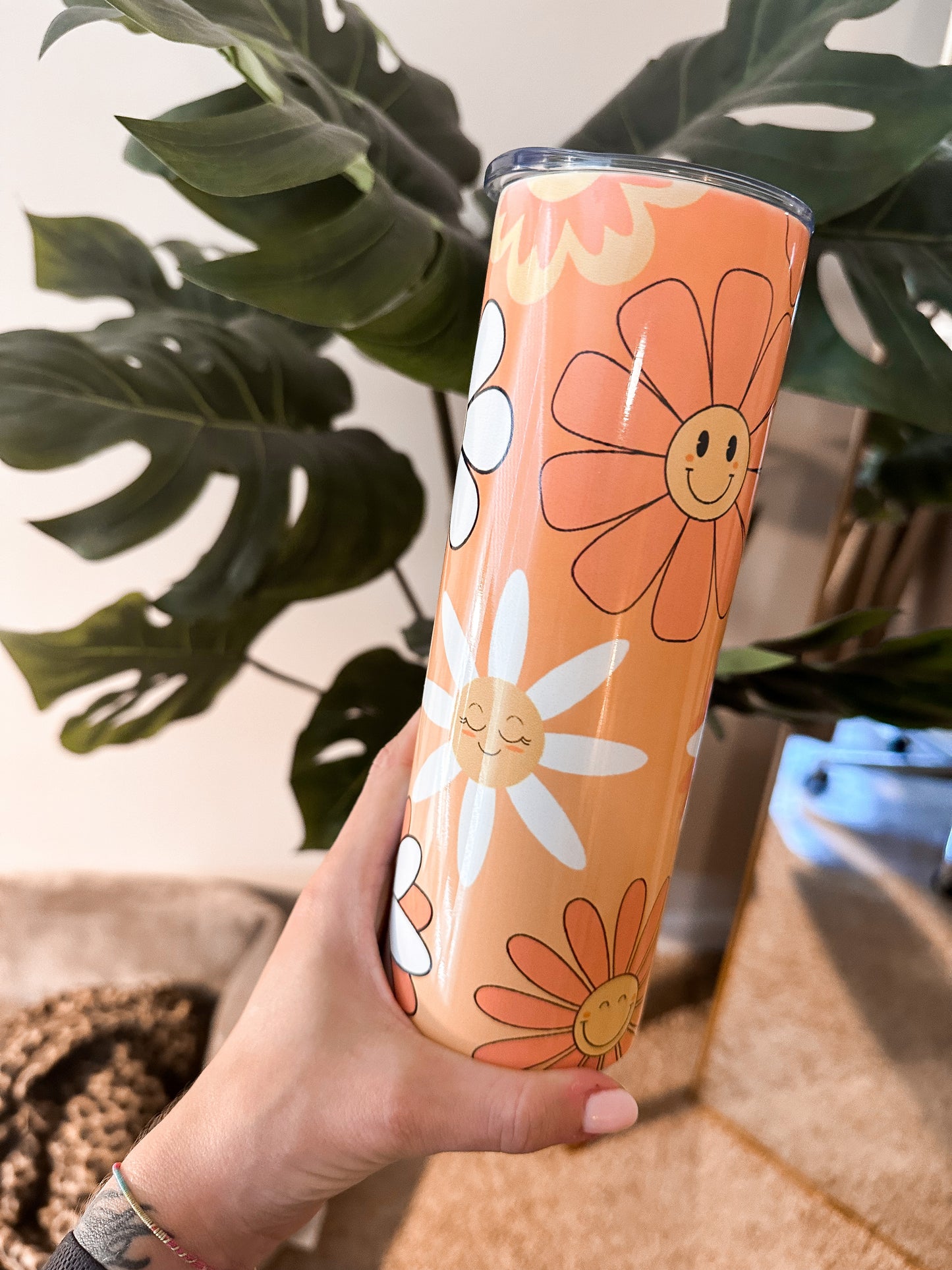 Orange Retro Flower 20 oz tumbler